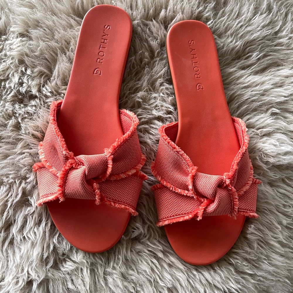 Rothy’s orange fringe knot slide Sandal